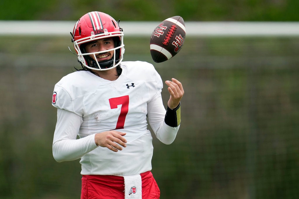 (Marcio Jose Sanchez | AP) Utah quarterback Cameron Rising smiles during practice ahead of the Rose Bowl NCAA college football game against Penn State Thursday, Dec. 29, 2022, in Carson, Calif.