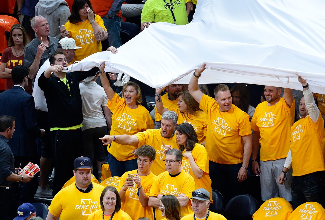 (Scott Sommerdorf | The Salt Lake Tribune)Fans have fun with the "Take Note" banner during pre game. The Houston Rockets led the Utah Jazz 70-40 at the half of game 3, Friday, May 4, 2018.