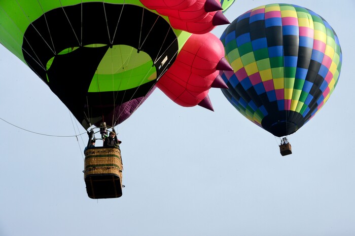 (Scott Sommerdorf | The Salt Lake Tribune)
Balloons, including the "Whoo'z Up" Owl balloon, left, launch at the 4th annual Autumn Aloft Hot Air Balloon Festival in Park City, Sunday, September 17, 2017.
