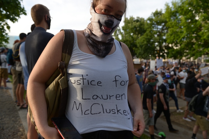 (Leah Hogsten  |  The Salt Lake Tribune)  A woman asks for justice for Lauren McCluskey during a protest against police brutality in Salt Lake City on Monday, June 1, 2020.