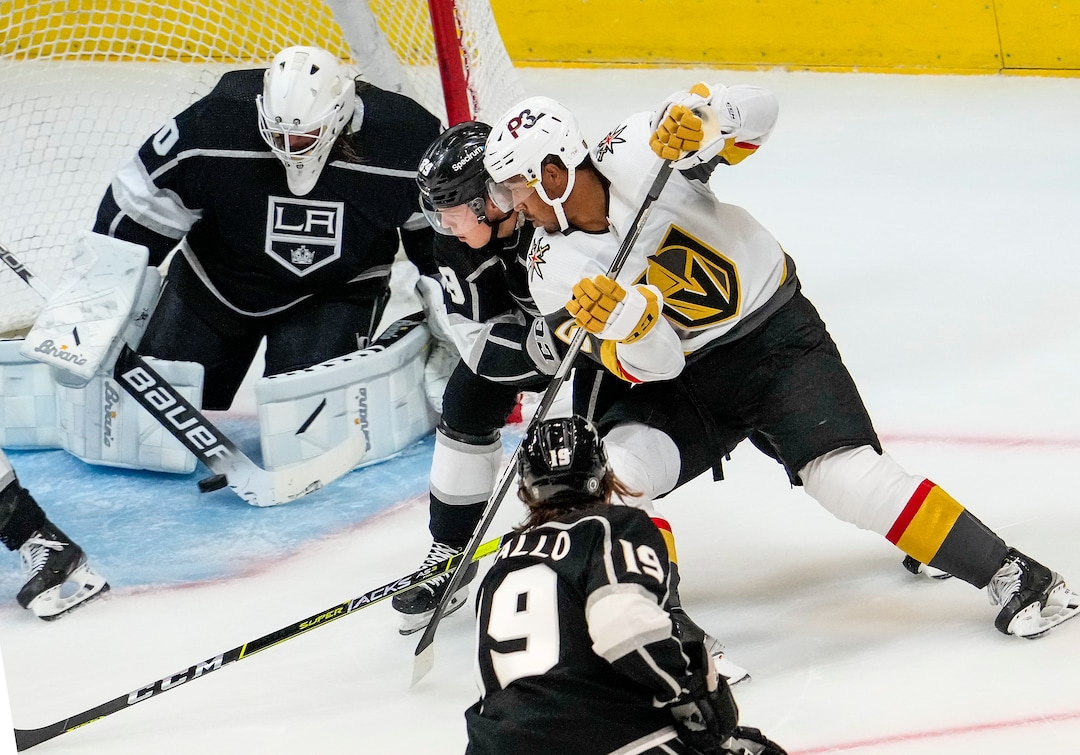 (Leah Hogsten | The Salt Lake Tribune) Vegas Golden Knights right wing Keegan Kolesar (55) shoots past Los Angeles Kings center Rasmus Kupari (89) but is stopped by Los Angeles Kings goalie Garret Sparks (80) as the Los Angeles Kings and Vegas Knights meet in a preseason game at Vivint Arena on Sept. 30, 2021.