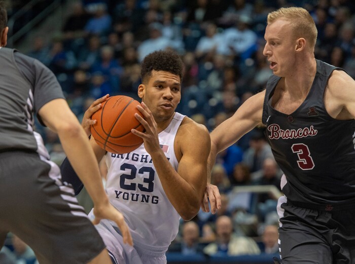 (Rick Egan  |  The Salt Lake Tribune)       Brigham Young Cougars forward Yoeli Childs (23) tries to get past Santa Clara Broncos forward Henrik Jadersten (3), in basketball action between Brigham Young Cougars and Santa Clara Broncos at the Marriott Center in Provo, Saturday, Jan. 12, 2019.


