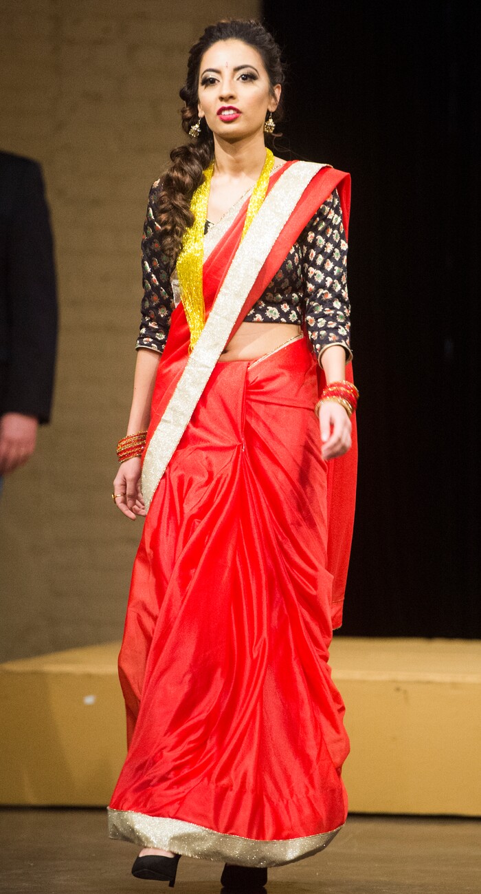 (Rick Egan  |  The Salt Lake Tribune) Aarati Ghimire from Nepal, walks the runwayat the 8th Annual Women of the World Fashion Show. The fashion show fund is raiser for the non-profit that seeks to help refugees settle in a new culture. Wednesday, March 7, 2018.