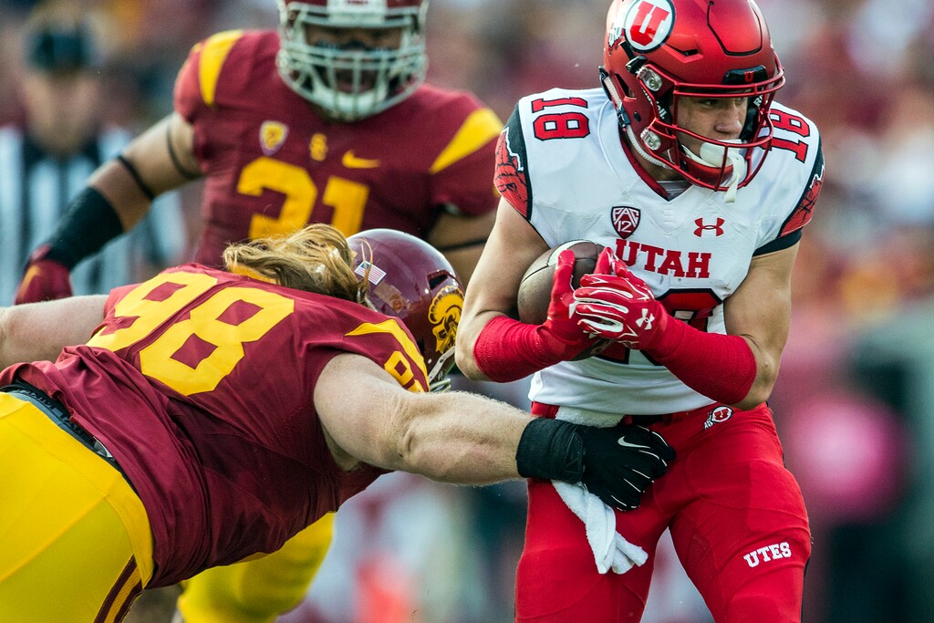 Chris Detrick  |  The Salt Lake TribuneUSC Trojans defensive tackle Cody Temple (98) tackles Utah Utes wide receiver Britain Covey (18) during the game at the Los Angeles Memorial Coliseum Saturday October 24, 2015.  