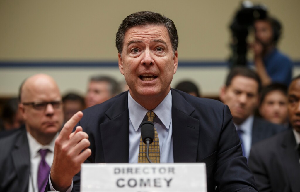 (J. Scott Applewhite | The Associated Press) In this July 7, 2016, file photo, FBI Director James Comey testifies before the House Oversight Committee about Hillary Clinton's email investigation, at the Capitol in Washington. Text messages between two FBI officials that have been reviewed by The Associated Press show they spoke admiringly of Comey at the time. The text messages were provided by the Justice Department to Congress, and are part of an inspector general investigation into the handling of the Hillary Clinton email inquiry. One exchange took place in July 2016 as Comey defended to Congress the FBI’s decision not to bring charges in that case.