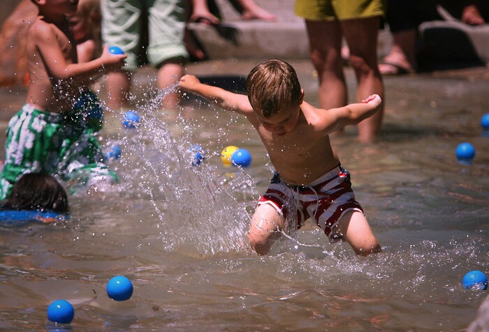 Ryan Galbraith  |  Tribune file photo


Four-year-old Fischer Adams splashes in the Seven Canyons Fountain in Liberty Park in 2006.

Ê