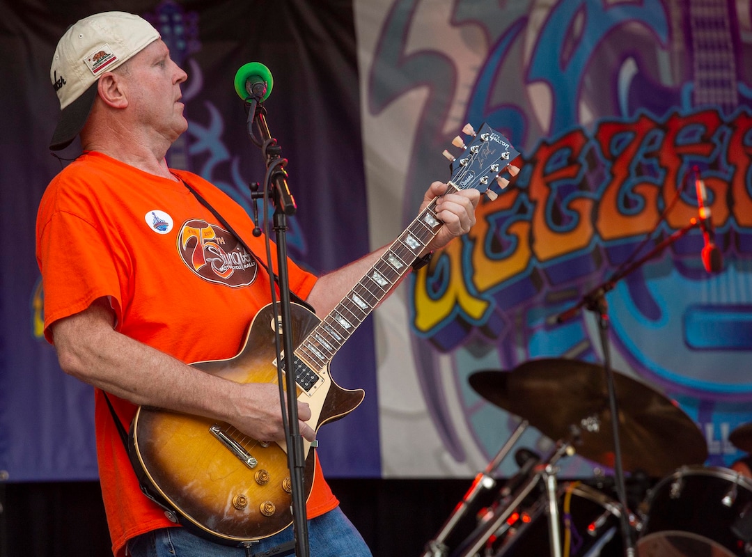 (Rick Egan  |  The Salt Lake Tribune)  Klayne Rasmussen plays guitar for Everett Lincoln, at the annual Geezerfest 2020, in Orem on Friday, Aug. 14, 2020.