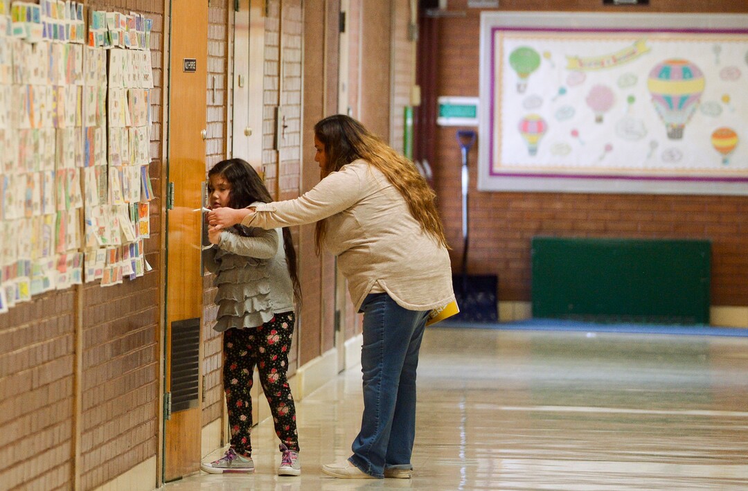 (Leah Hogsten  |  The Salt Lake Tribune) David Gourley Elementary School student Danna Godinez and her mother can benefit from the new food pantry dedicated to the school,Tuesday, March 13, 2018. Smiths Food & Drug is helping to open a food pantry at David Gourley Elementary School in Kearns, where 80 percent of the 646 students qualify for free or reduced lunches. 