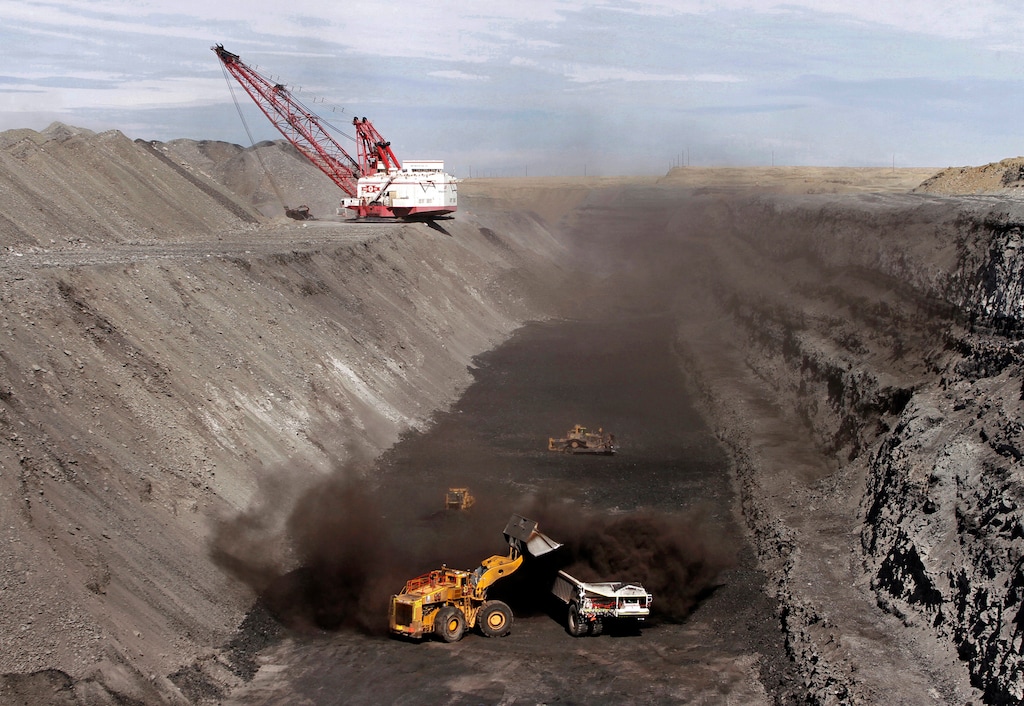 (Jon Austria/The Daily Times via AP, File)
A front end loader dumps coal into a hauler at a mining operation at the Navajo Mine in Fruitland, N.M. in 2013. The Navajo Nation will not financially back bonds a tribal energy company needs for a trio of newly acquired coal mines off the reservation, the tribal president said Tuesday, explaining that it's too risky and his administration wants the company to move away from coal. The Navajo Transitional Energy Co. recently bought Montana's largest coal mine and two mines in Wyoming at auction after Cloud Peak Energy declared bankruptcy.