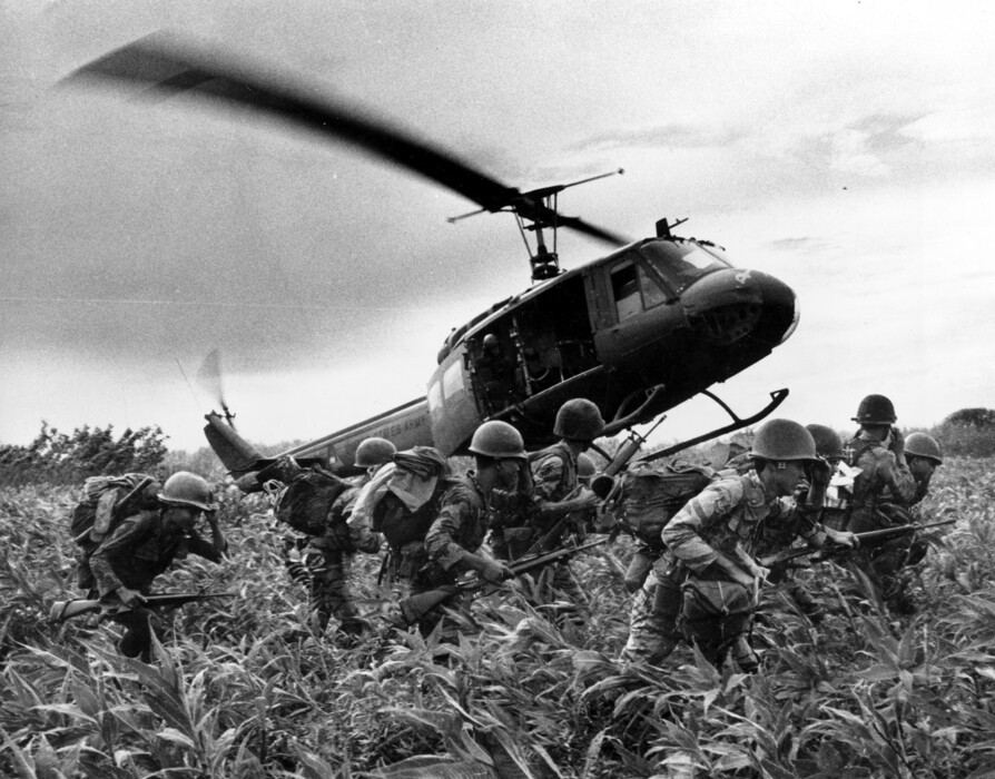 (AP Photo/Nick Ut, File)

In this June 1970 photo, taken by Associated Press photographer Huynh Cong "Nick" Ut, south Vietnamese Marines rush to the point where descending U.S. Army helicopter will pick them up after a sweep east of the Cambodian town of Prey-Veng during the Vietnam War.