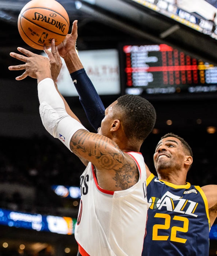 (Trent Nelson | The Salt Lake Tribune)  Utah Jazz forward Thabo Sefolosha (22) blocks a shot by Portland Trail Blazers guard Damian Lillard (0) as the Utah Jazz host the Portland Trail Blazers, NBA basketball in Salt Lake City, Wednesday November 1, 2017.