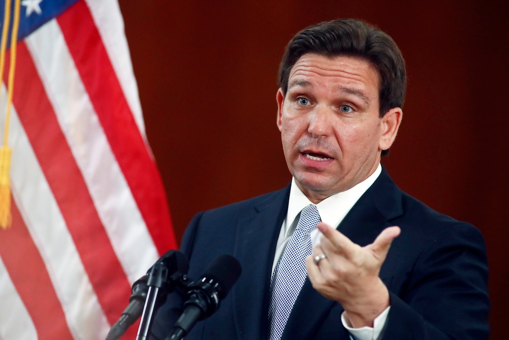FILE - Florida Gov. Ron DeSantis answers questions from the media in the Florida Cabinet following his State of the State address during a joint session of the Senate and House of Representatives, Tuesday, March 7, 2023, at the state Capitol in Tallahassee, Fla. (AP Photo/Phil Sears, File)