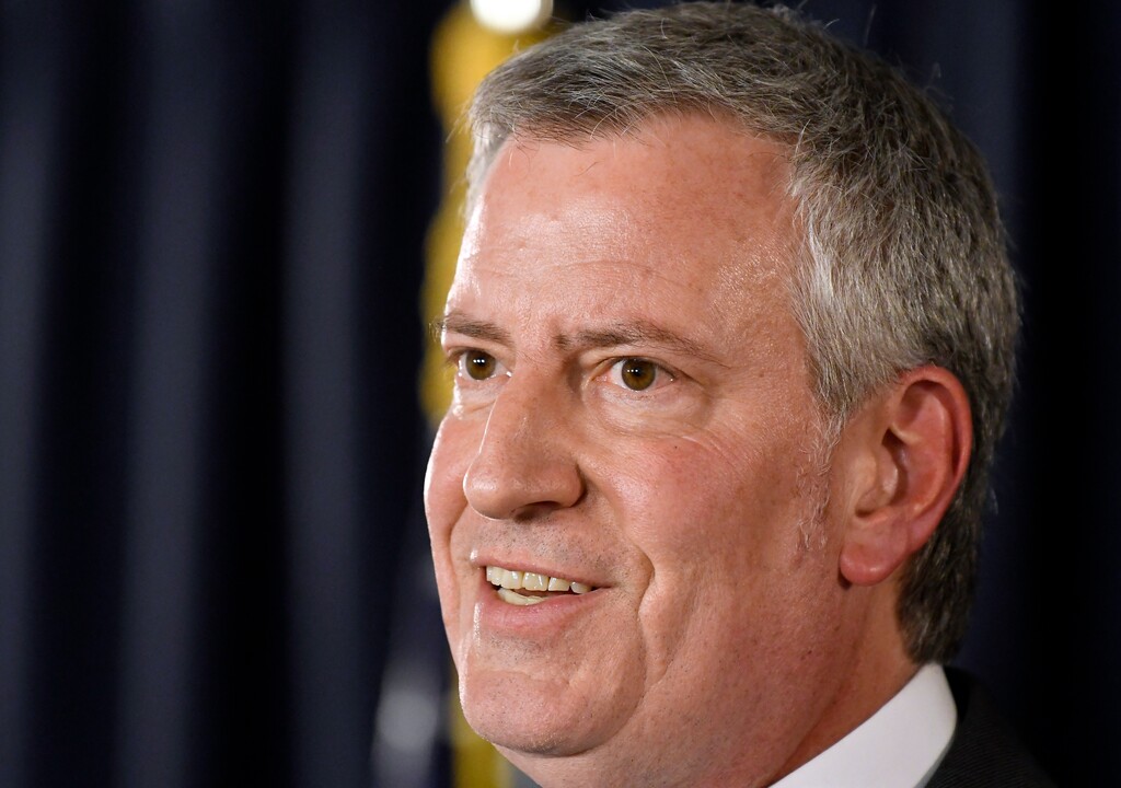 FILE - In this March 26, 2019, file photo, New York City Mayor Bill de Blasio speaks about New York City budget priorities during a news conference at the state Capitol in Albany, N.Y. De Blasio says he will announce in May 2019 whether he will join the growing list of candidates seeking the Democratic nomination for president. (AP Photo/Hans Pennink, File)