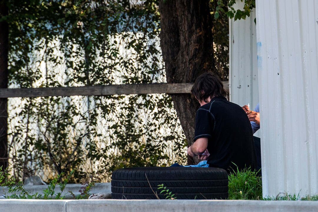 (Chris Detrick  |  The Salt Lake Tribune)  Men outside of Gateway Inn 819 West North Temple in Salt Lake City Tuesday, October 17, 2017. 