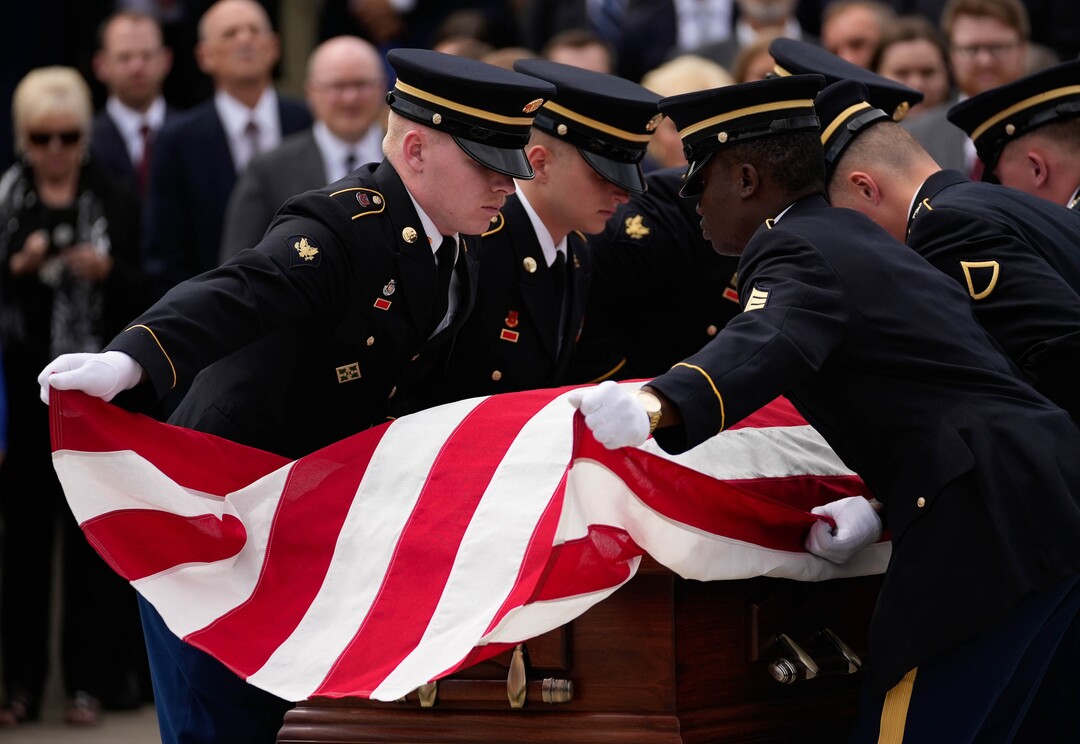 (Francisco Kjolseth | The Salt Lake Tribune) Pallbearers with the Utah Army National Guard fold the flag covering the casket of former U.S. Sen. Orrin G. Hatch following funeral services at The Church of Jesus Christ of Latter-day Saints Institute of Religion in Salt Lake City on Friday, May 6, 2022. Hatch, the longest-serving Republican in the U.S. Senate and the longest-serving senator from Utah, died April 23 at age 88.
