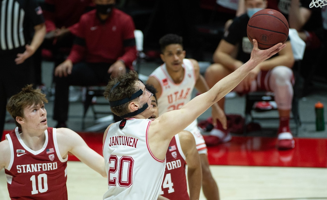 (Francisco Kjolseth  | The Salt Lake Tribune) Utah Utes forward Mikael Jantunen (20) stretches out for a basket as the Utes host the Stanford Cardinals on Thursday, Jan. 14, 2021 at the Jon M. Huntsman Center in Salt Lake City.