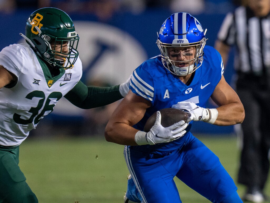 (Rick Egan | The Salt Lake Tribune)  Baylor Bears linebacker Tyrone Brown (36) chases Brigham Young Cougars tight end Dallin Holker (5), in football action between the Brigham Young Cougars and the Baylor Bears at LaVell Edwards Stadium in Provo, on Saturday, Sept. 10, 2022.