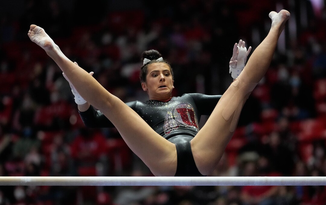 (Francisco Kjolseth | The Salt Lake Tribune) Utah’s Alexia Burch competes on the bars during their gymnastics meet with Stanford at the Huntsman Center in Salt Lake City, Saturday, Jan. 29, 2022.