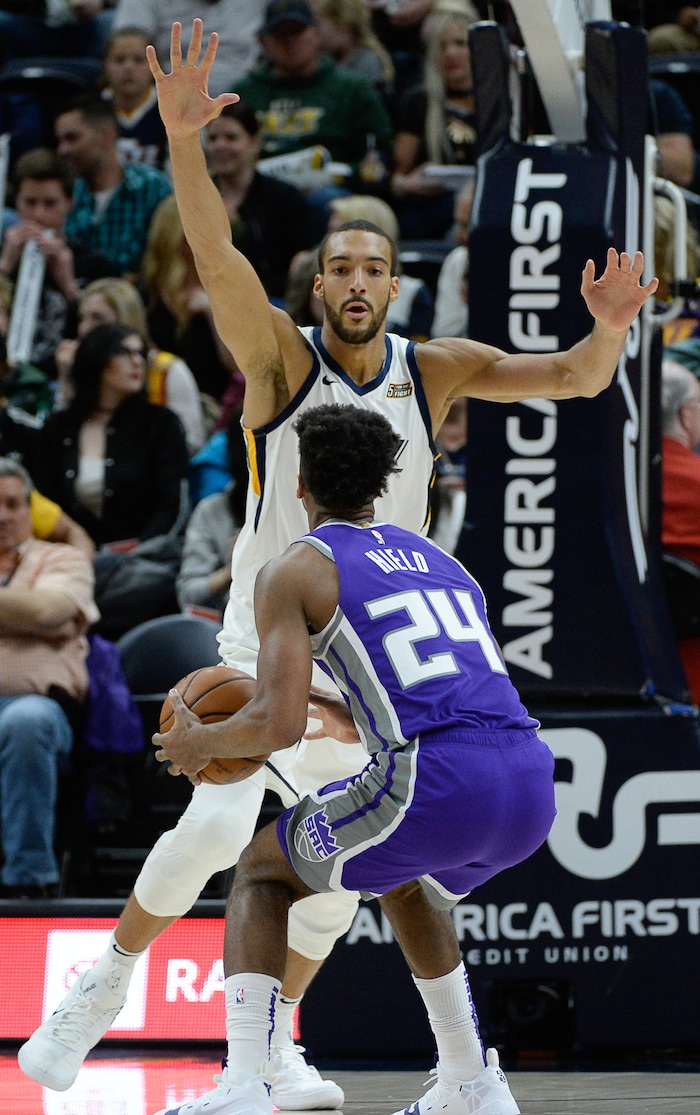(Francisco Kjolseth  |  The Salt Lake Tribune)  Sacramento Kings guard Buddy Hield (24) faces Utah Jazz center Rudy Gobert (27) as the Utah Jazz host the Sacramento Kings in their NBA game at Vivint Smart Home Arena Friday, April 5, 2019, in Salt Lake City.