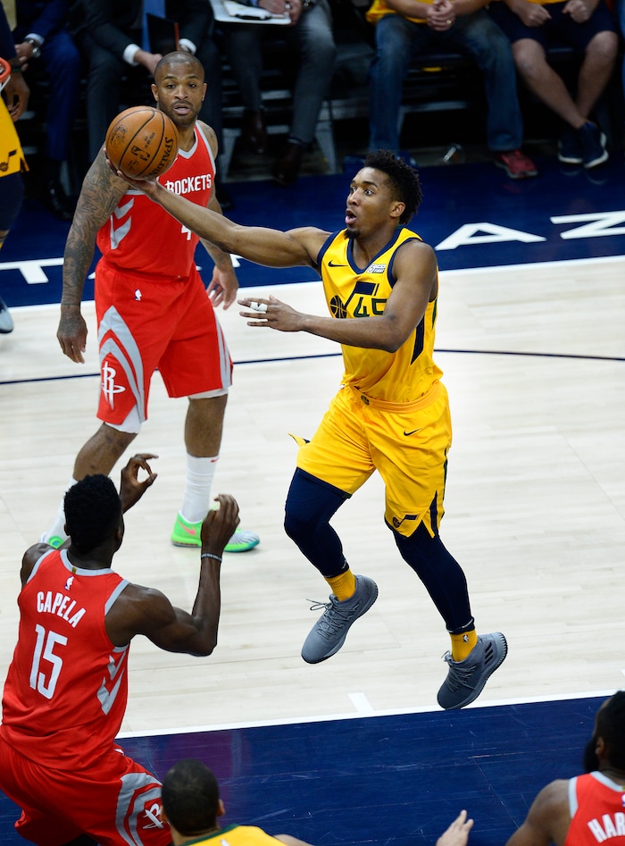 (Scott Sommerdorf | The Salt Lake Tribune)
Utah Jazz guard Donovan Mitchell (45) slices in for an easy layup during first half play. The Rockets led the Jazz 58-48 at the half, Sunday, May 6, 2018.