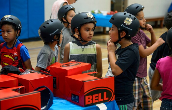 Steve Griffin  |  The Salt Lake TribuneKids at the Lied Boys & Girls Club open their own bike helmet donated by UnitedHealthcare to help encourage kids and families to participate in the Tour of Utah kids’ events. Club youth will received the helmets and a helmet-fitting from UnitedHealthcare Pro Cycling Team members, as well as a lesson in helmet and bike safety in Salt Lake City Friday July 28, 2017.