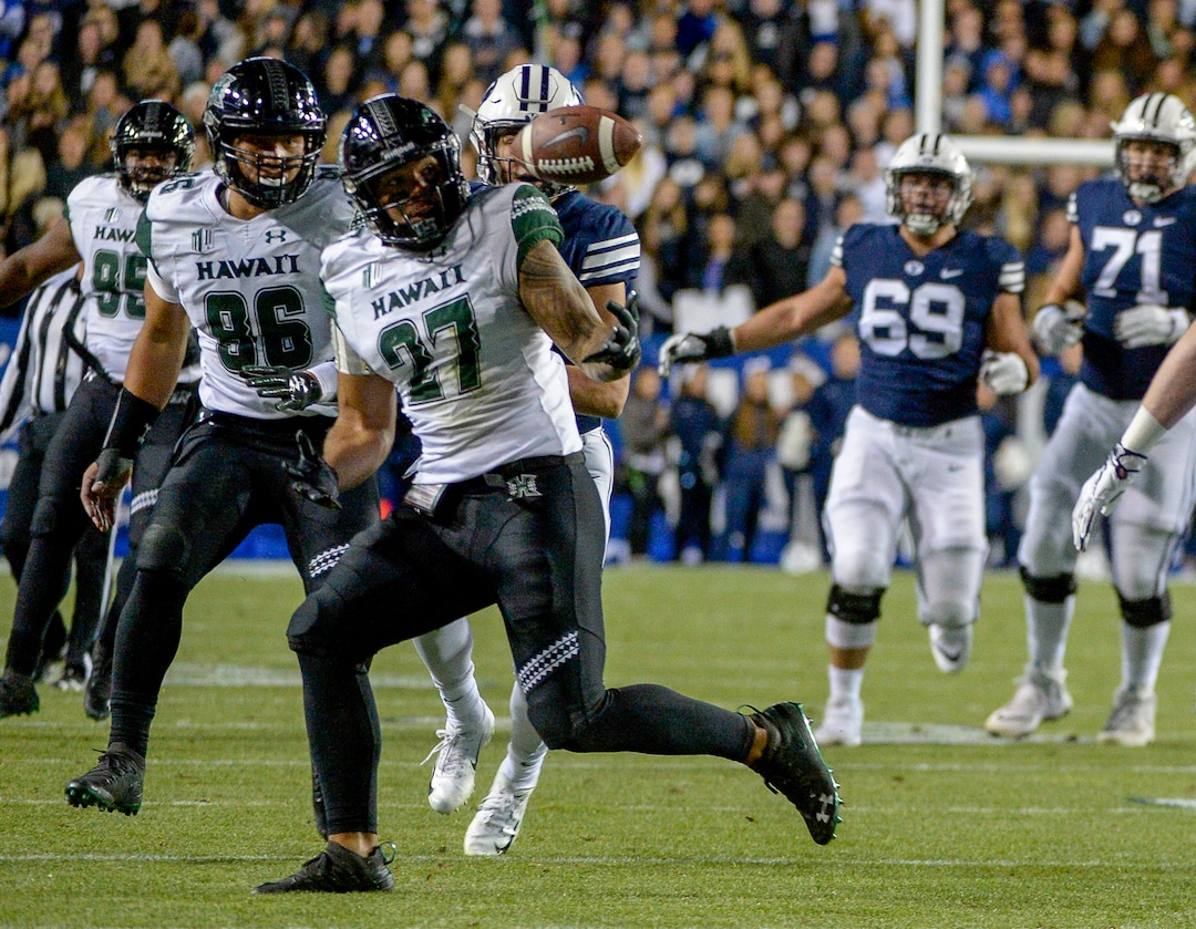 Leah Hogsten  |  The Salt Lake Tribune  Hawaii linebacker Solomon Matautia (27) fumbles an would-3be interception as Brigham Young University hosts Hawaii at Lavell Edwards Stadium in Provo, Saturday Oct. 13, 2018. 