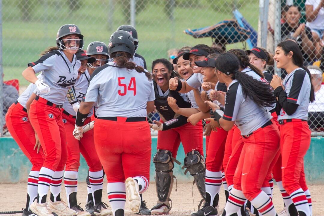 (Rick Egan  |  The Salt Lake Tribune)     West high celebrates as short stop Huntyr Ava crosses home plate after hitting another home run for the Panthers, in the 5A state championship game in Taylorsville, Thursday May 30, 2019