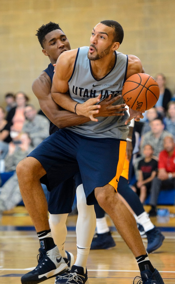 (Steve Griffin  |  The Salt Lake Tribune)    Utah Jazz center Rudy Gobert as Donovan Mitchell tries to guard him as the Jazz scrimmage in the Warrior Fitness Center on Hill Air Force Base as a part of a "Hoops for Troops" promotion Ogden Friday September 29, 2017. It's also Utah's first public scrimmage of the season, and the first look at how the new pieces of the team will work together. 