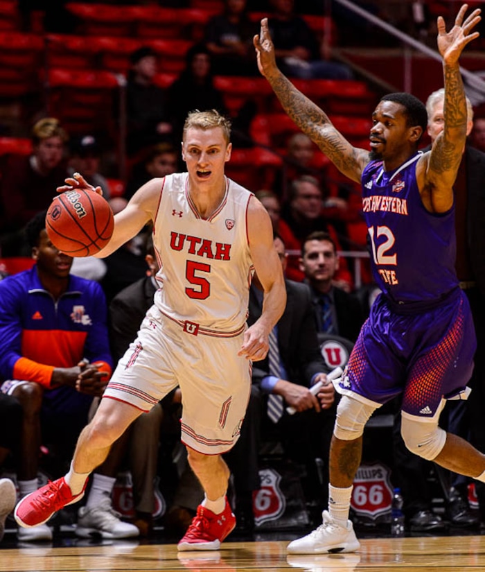 (Trent Nelson | The Salt Lake Tribune)  Utah Utes guard Parker Van Dyke (5) defended by Northwestern State Demons guard Jalan West (12) as the University of Utah hosts Northwestern State, NCAA basketball in Salt Lake City, Wednesday December 20, 2017.