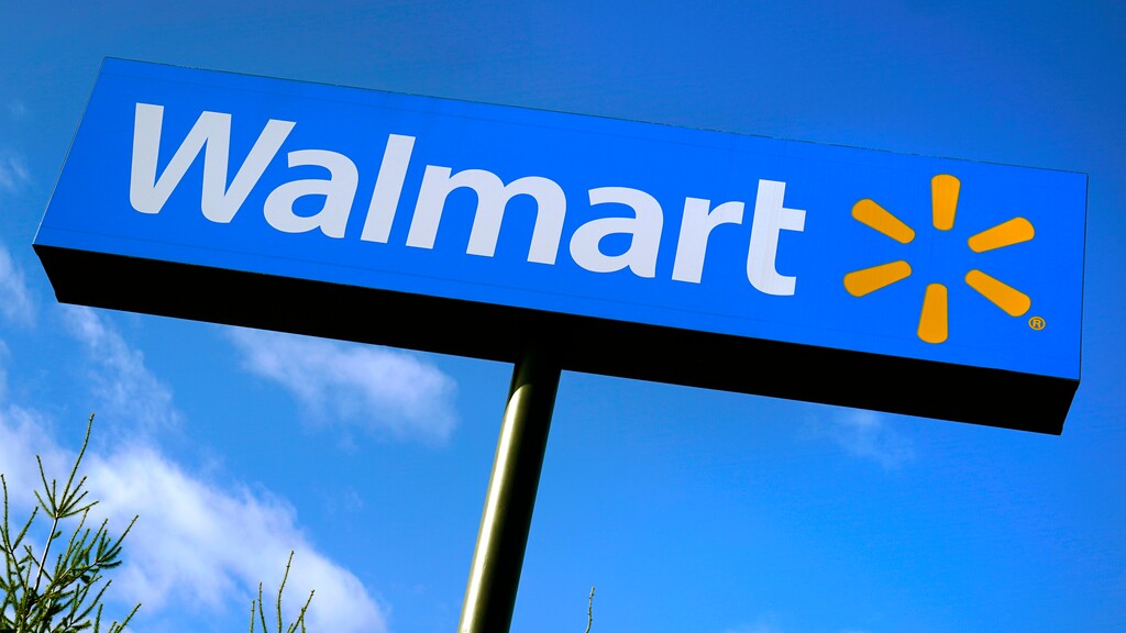 FILE - A Walmart store sign is visible from Route 28 in Derry, N.H. (AP Photo/Charles Krupa, File)