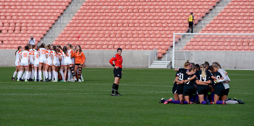 (Chris Samuels | The Salt Lake Tribune) Skyridge and Riverton huddle before the 6A girls’ soccer state championships at Rio Tinto Stadium in Sandy, Friday, Oct. 22, 2021.