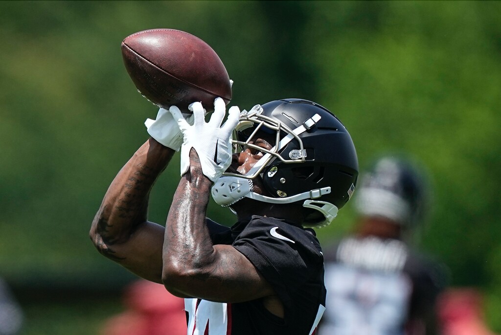 (Brynn Anderson | AP) Atlanta Falcons defensive back Clark Phillips III (34) runs drills during the NFL football team's rookie minicamp, Saturday, May 13, 2023, in Flowery Branch, Ga. Falcons rookie cornerback Clark Phillips III was carted off the practice field with a leg injury during Tuesday's, Aug. 8, 2023, joint practice with the Miami Dolphins.