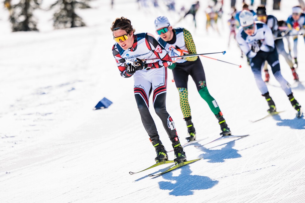 (Nick Grace | University of Utah) Samuel Hendry of the University of Utah men's Nordic team leads a pack during the NCAA Skiing Championships in at Soldier Hollow in Heber on Saturday, March 12, 2022.