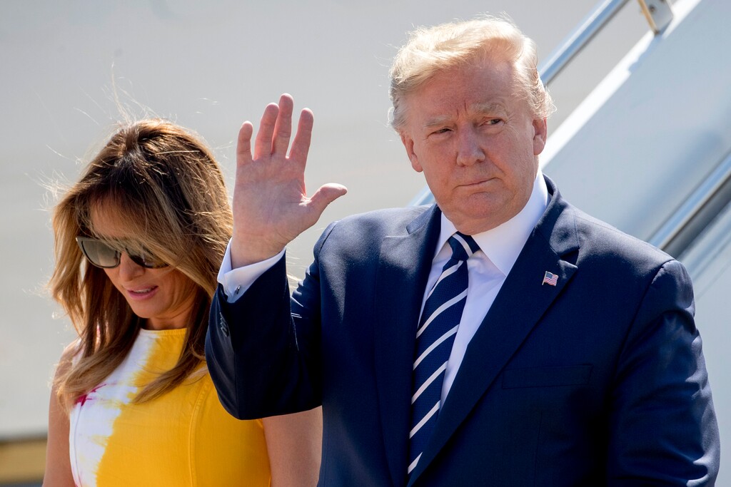 U.S President Donald Trump and first lady Melania Trump arrive in Biarritz, France, Saturday, Aug. 24, 2019, for the G-7 summit. (AP Photo/Andrew Harnik)