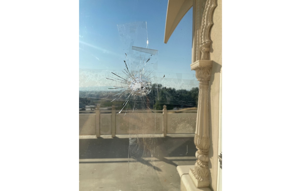 (Krishna Temple security staff) A bullet hole in a window of the Sri Sri Radha Krishna Temple near Spanish Fork.