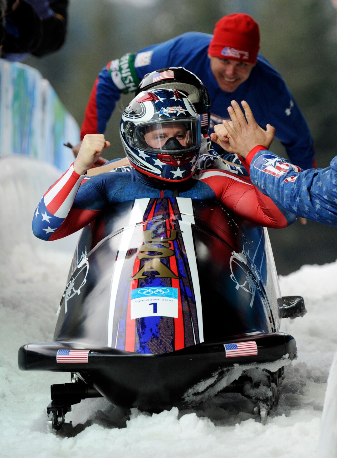 The United States' USA-1, with Steven Holcomb, front, Justin Olsen, Steve Mesler, and Curtis Tomasevicz, celebrate their gold medal finish during the men's four-man bobsled final competition at the Vancouver 2010 Olympics in Whistler, British Columbia, Saturday, Feb. 27, 2010. (AP Photo/Jens Meyer)