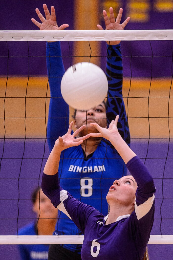 (Trent Nelson  |  The Salt Lake Tribune)  North Summit's Hannah Lamon (6) and Bingham's Annissa Kehl (8) as North Summit hosts Bingham, high school girls' volleyball in Coalville, Thursday August 17, 2017.