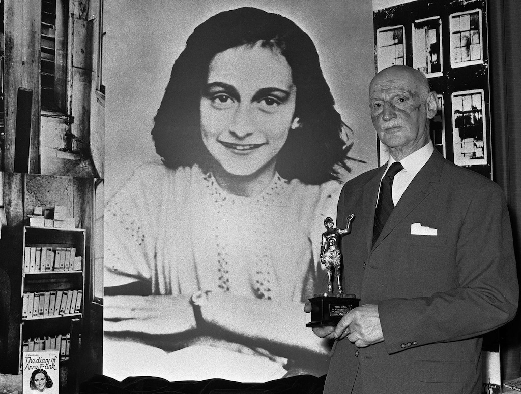 FILE - In this Monday, June 14, 1971 photo Dr. Otto Frank holds the Golden Pan award, given for the sale of one million copies of the famous paperback 'The Diary of Anne Frank' in London, Great Britain. (AP Photo/Dave Caulkin, file)