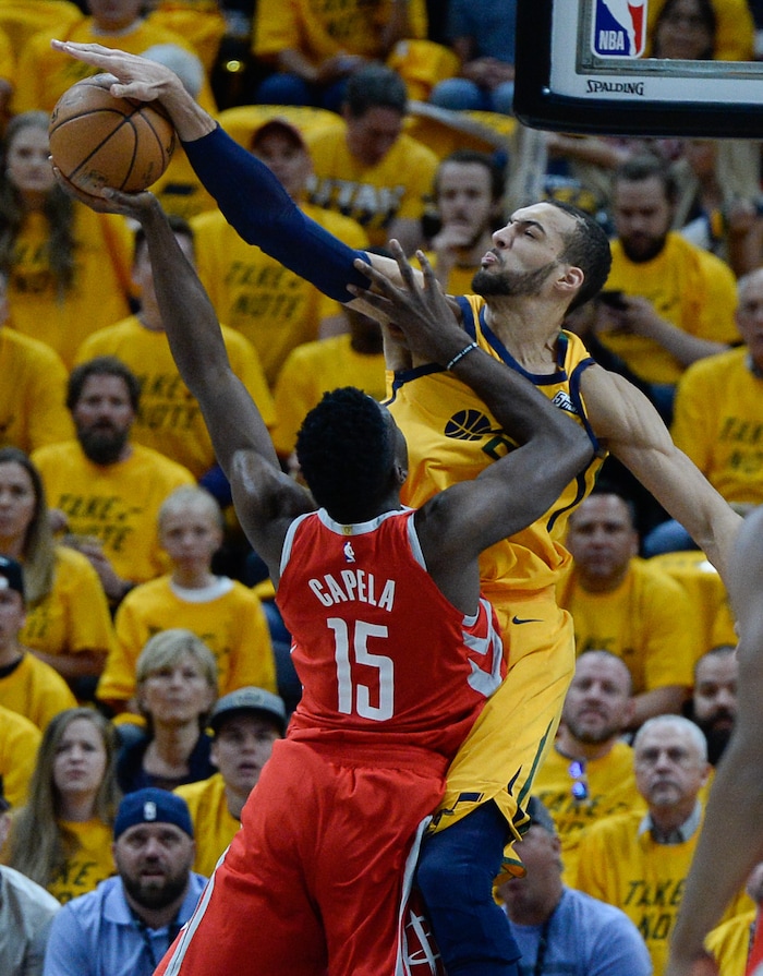 (Francisco Kjolseth | The Salt Lake Tribune) Houston Rockets center Clint Capela (15) is shut down by Utah Jazz center Rudy Gobert (27) as the Utah Jazz take on the Houston Rockets in Game 4 of the NBA playoffs at the Vivint Smart Home Arena Sunday, May 6, 2018 in Salt Lake City.
