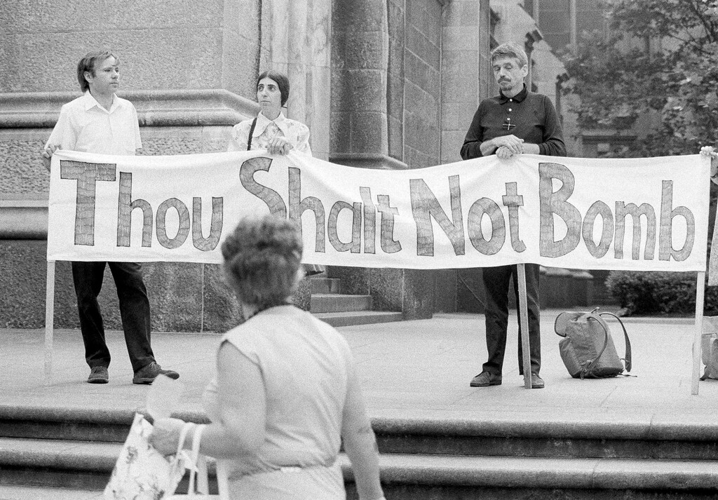 (Ron Frehm | AP Photo) This July 25, 1973, file photo shows Rev. Fr. Daniel Berrigan and some friends participating in a fast and vigil to protest the bombing in Cambodia, on the steps of St. Patricks Cathedral in New York City.  The Roman Catholic priest and Vietnam war protester, Berrigan has died. He was 94. Michael Benigno, a spokesman for the Jesuits USA Northeast Province, says Berrigan died Saturday at a Jesuit infirmary at Fordham University.
