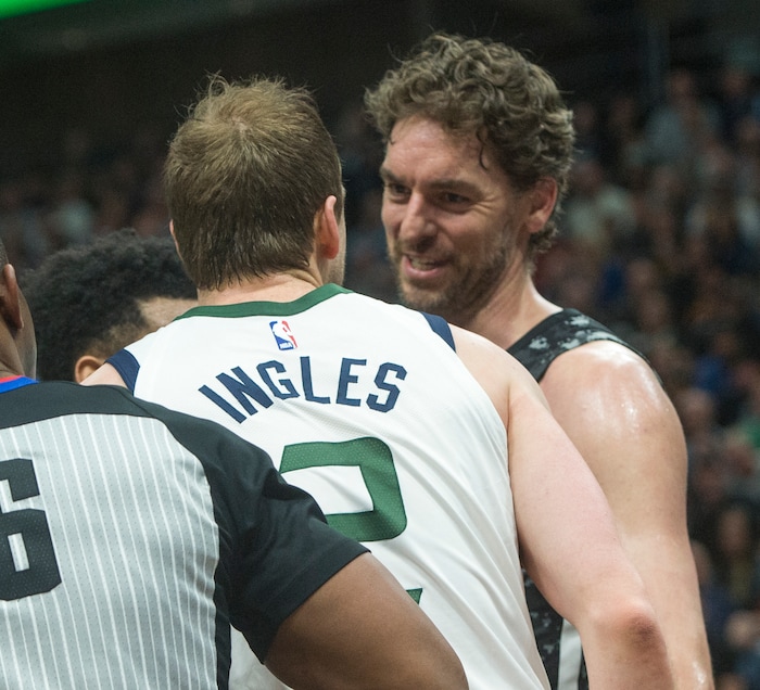 (Rick Egan  |  The Salt Lake Tribune)   San Antonio Spurs center Pau Gasol (16) has a few words withUtah Jazz forward Joe Ingles (2) after Ingles was fouled, in NBA action, in Salt Lake City, Monday, February 12, 2018.