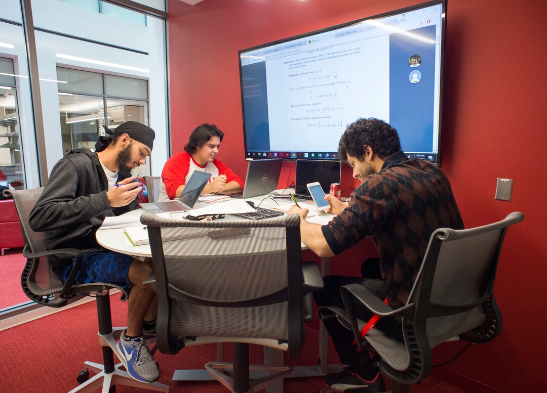 (Rick Egan  |  The Salt Lake Tribune)     Tyler Crum, Nirmole Tambhar and  Mahdi Sofla study in a study room at the new Gary and Ann Crocker Science Center at the University of Utah, Thursday, April 19, 2018.