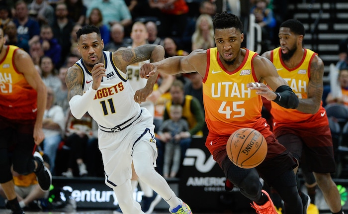 (Francisco Kjolseth  |  The Salt Lake Tribune)  Utah Jazz guard Donovan Mitchell (45) carries it down court as the Utah Jazz host the Denver Nuggets in their NBA game at Vivint Smart Home Arena Tuesday, April 9, 2019, in Salt Lake City.
