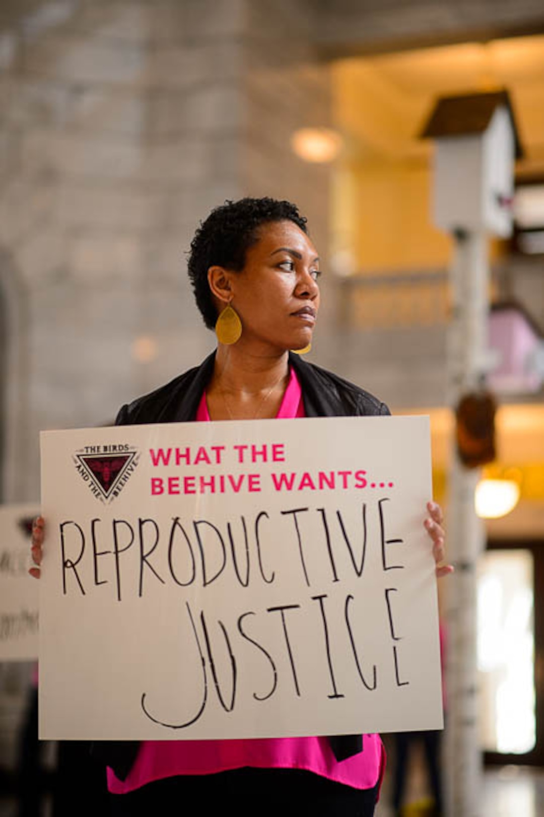 (Trent Nelson | The Salt Lake Tribune)  Liz Owens and other supporters of Planned Parenthood Association of Utah gathered in a silent protest in the Utah State Capitol Rotunda Friday March 1, 2019, while a 12-foot birdhouse art installation broadcast statements from Utah constituents.