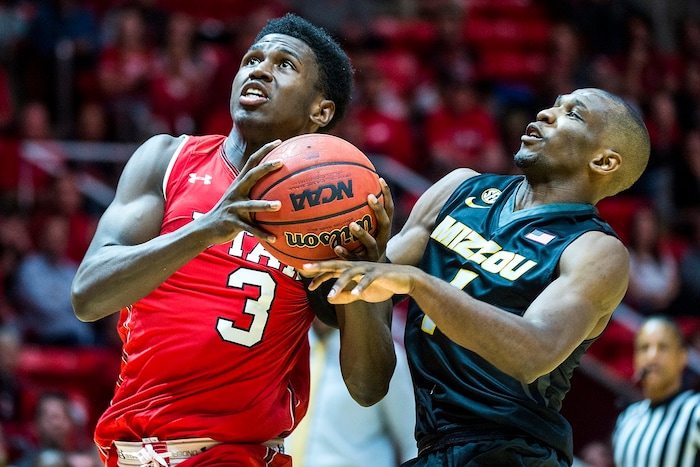 (Chris Detrick  |  The Salt Lake Tribune)  Utah Utes forward Donnie Tillman (3) shoots past Missouri Tigers guard Terrence Phillips (1) during the game at the Jon M. Huntsman Center Thursday, November 16, 2017.   