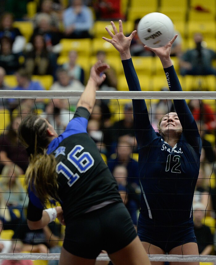(Francisco Kjolseth  |  The Salt Lake Tribune)  Kazna Tarawhiti of Pleasant Grove spikes one past Lauren Sotomayor in their quarterfinal match at the UCCU Center at Utah Valley University on Thursday, Nov. 2, 2017. Pleasant Grove went on to win in three straight sets.