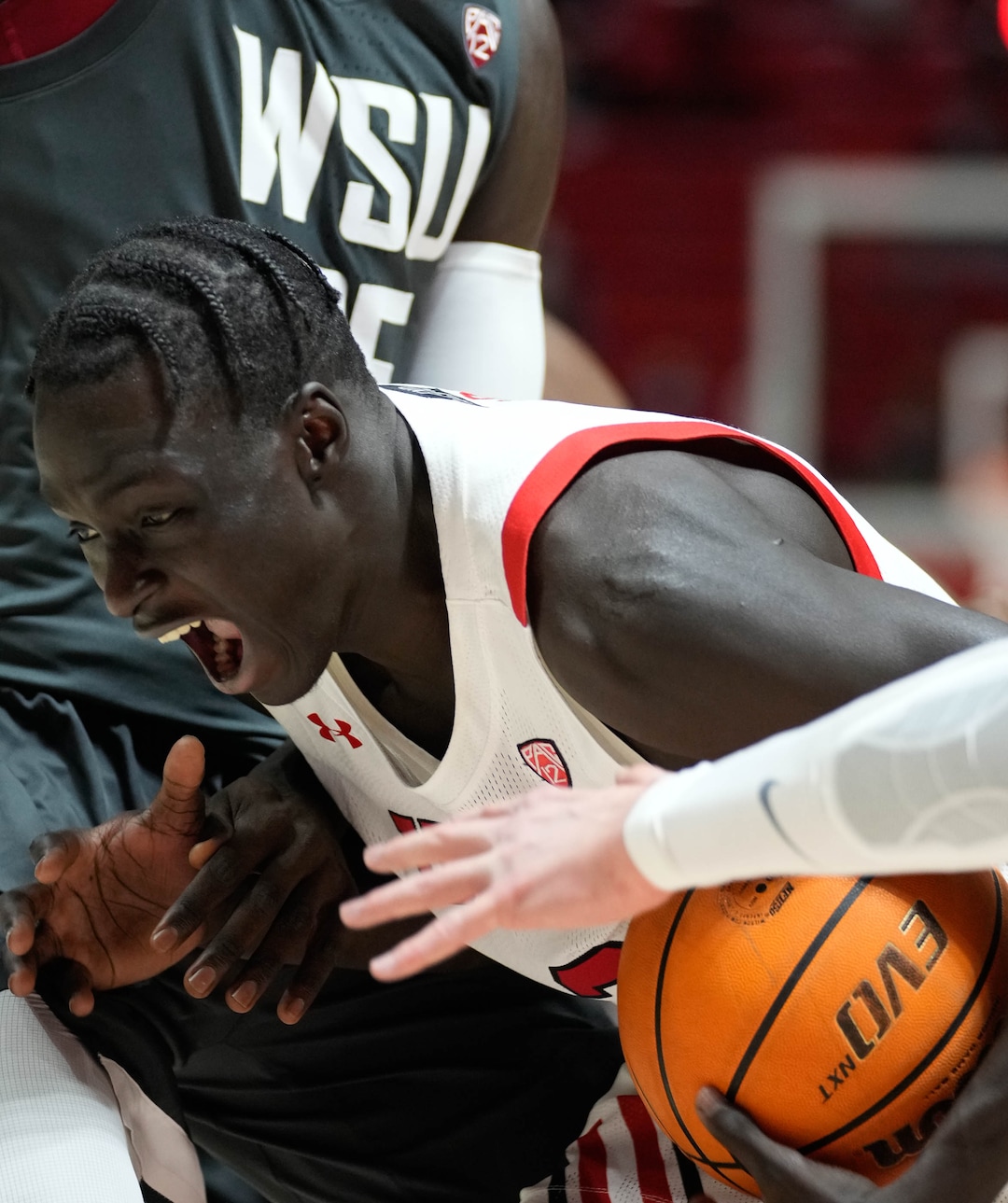 (Francisco Kjolseth | The Salt Lake Tribune) Utah Utes guard Both Gach (2) hits a wall put on by the Washington State Cougars in game action during an NCAA college basketball game at the Jon M.Huntsman Center, on Saturday, Jan. 8, 2022. Utah lost 61-77.