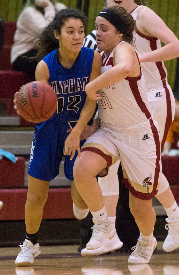 (Rick Egan  |  The Salt Lake Tribune)    Bingham High guard, Ameleya Angilau (12) is guarded by Madi Toole (31), Viewmont, in prep basketball action, Bingham vs. Viewmont, in Bountiful, Wednesday, January 3, 2018.