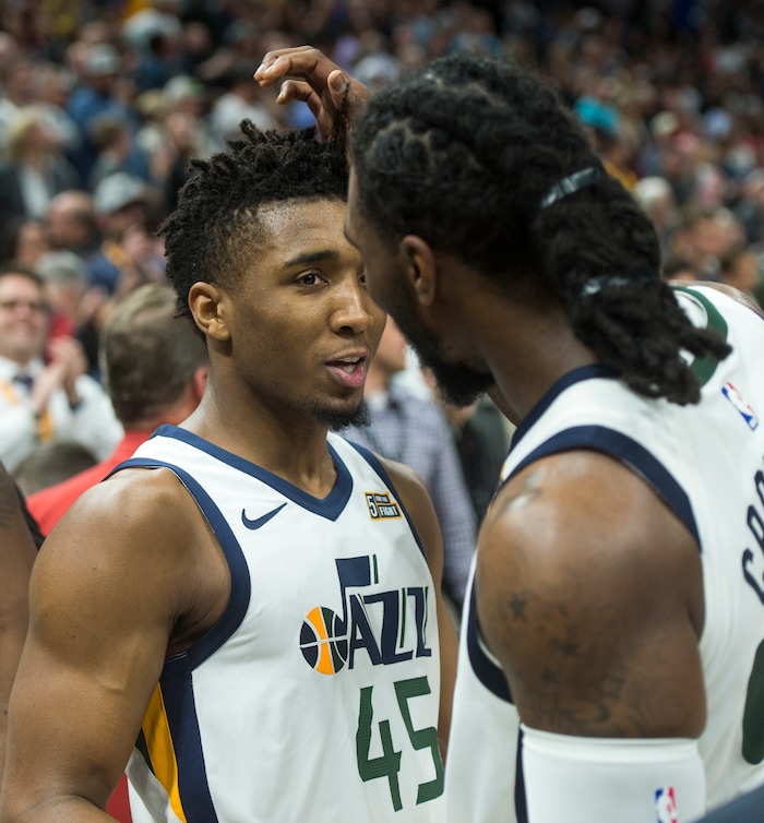 (Rick Egan  |  The Salt Lake Tribune)  Utah Jazz guard Donovan Mitchell (45) talks to Utah Jazz forward Jae Crowder (99) as the out lasted the Spurs 101-99, in NBA action in Salt Lake City, Monday, February 12, 2018.
