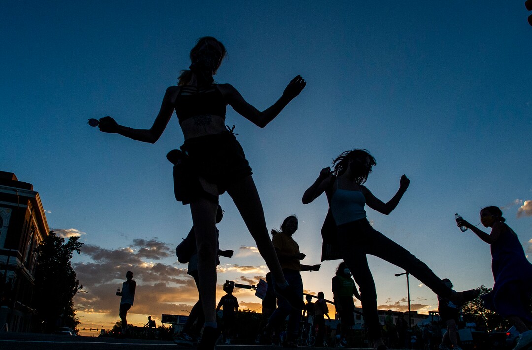 (Rick Egan | The Salt Lake Tribune) Protesters dance in the streets of Salt Lake City, ruing a march for social justice on Friday, July 3, 2020.
